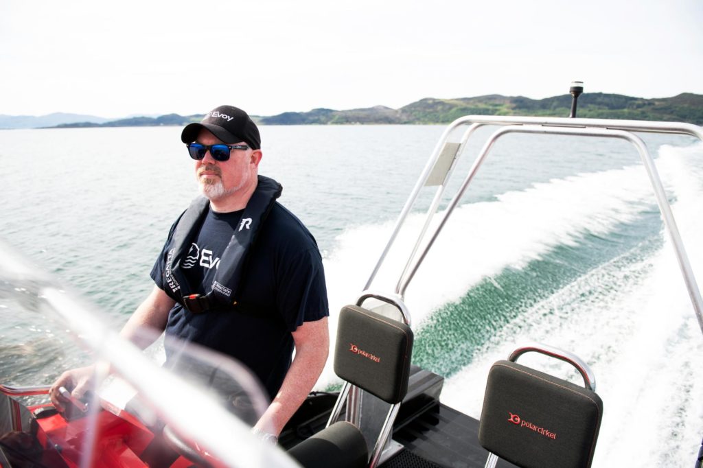 Image of Leif A. Stavøstrand driving Evoy1 electric boat